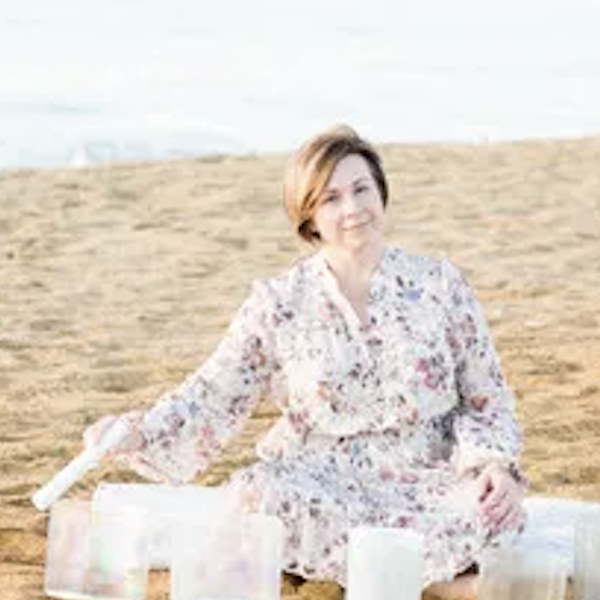 a person sitting at a beach