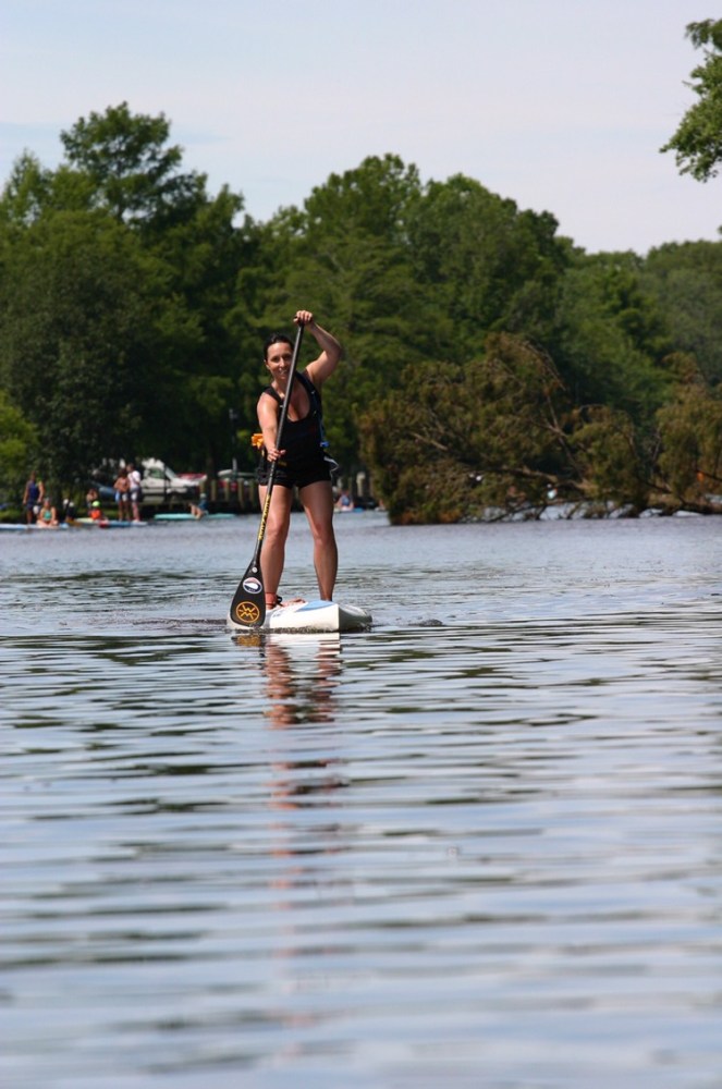 a man riding a surfboard in the water