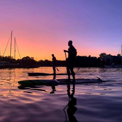 a sunset over a body of water