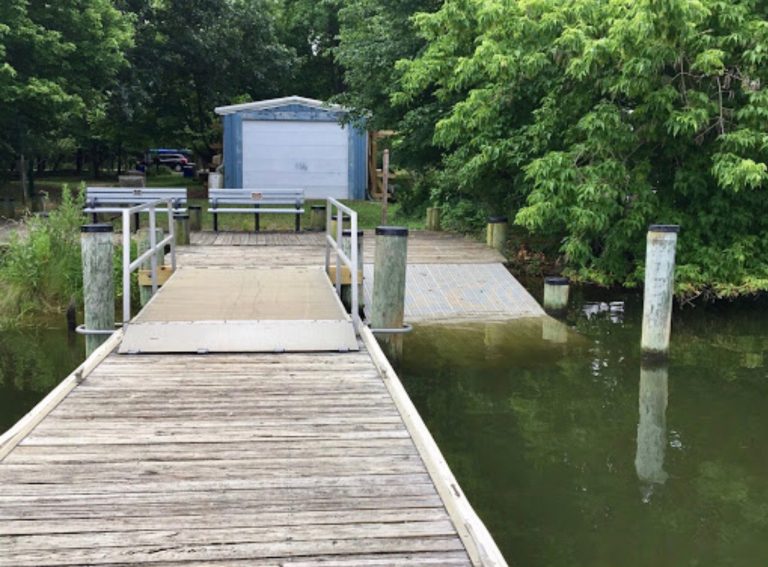 a wooden dock over some water