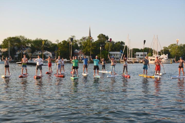 a group of people on a boat in the water