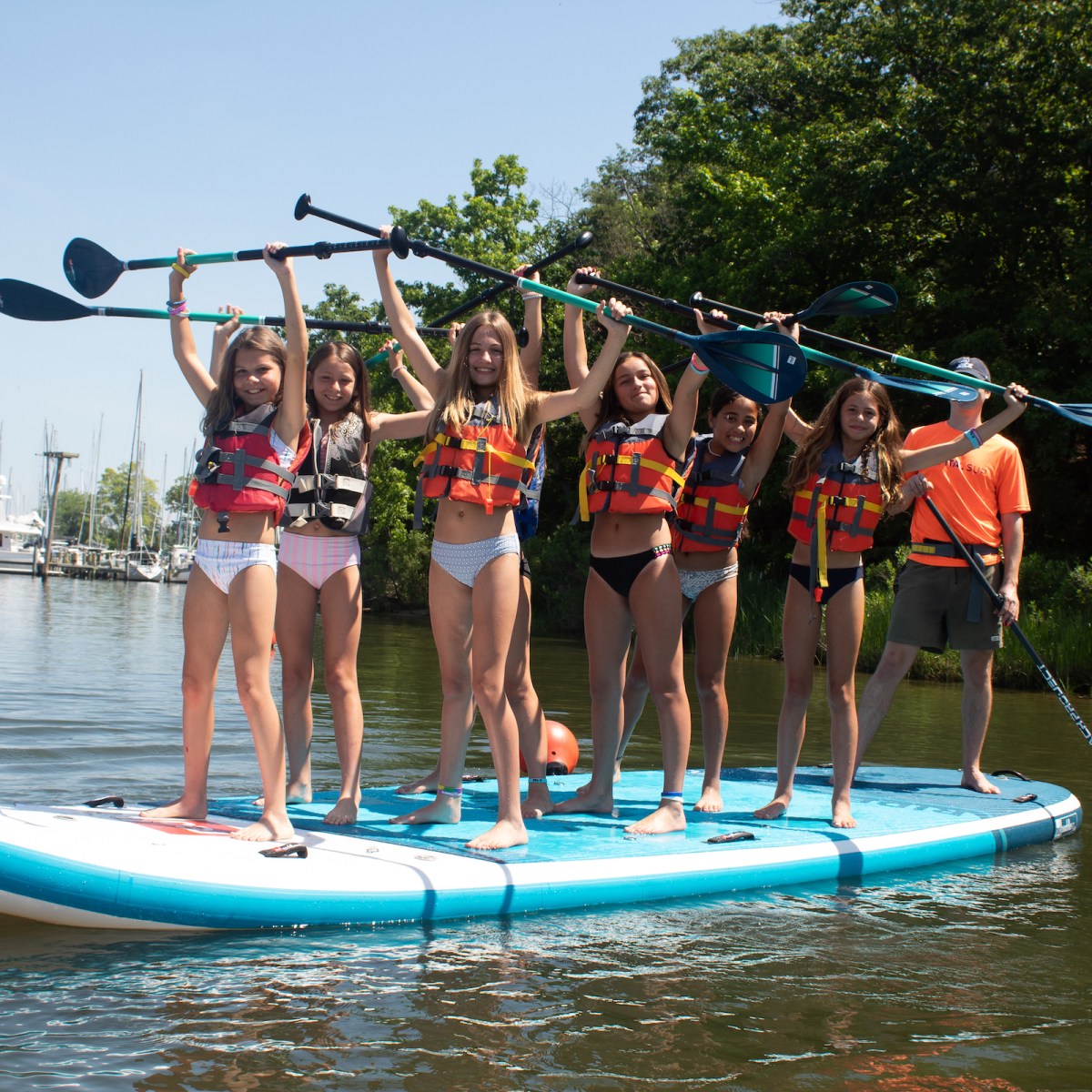 Birthday Party with 7 girls on one large Paddleboard and Instructor