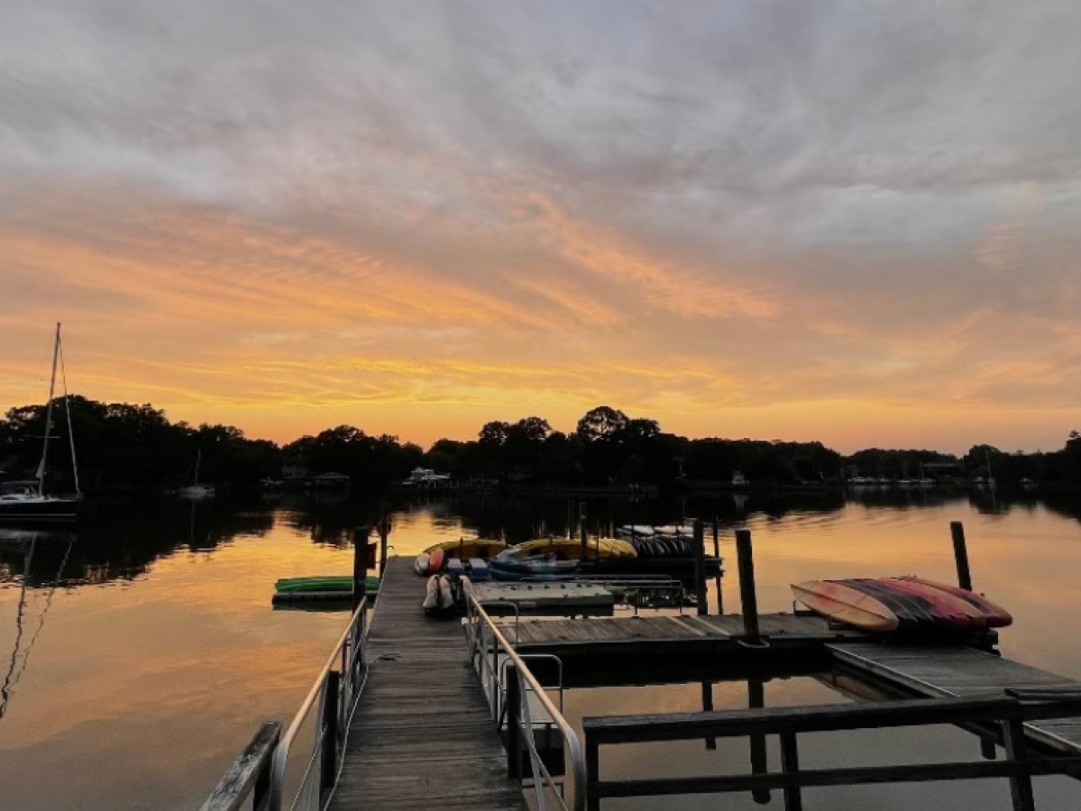 a sunset over a body of water