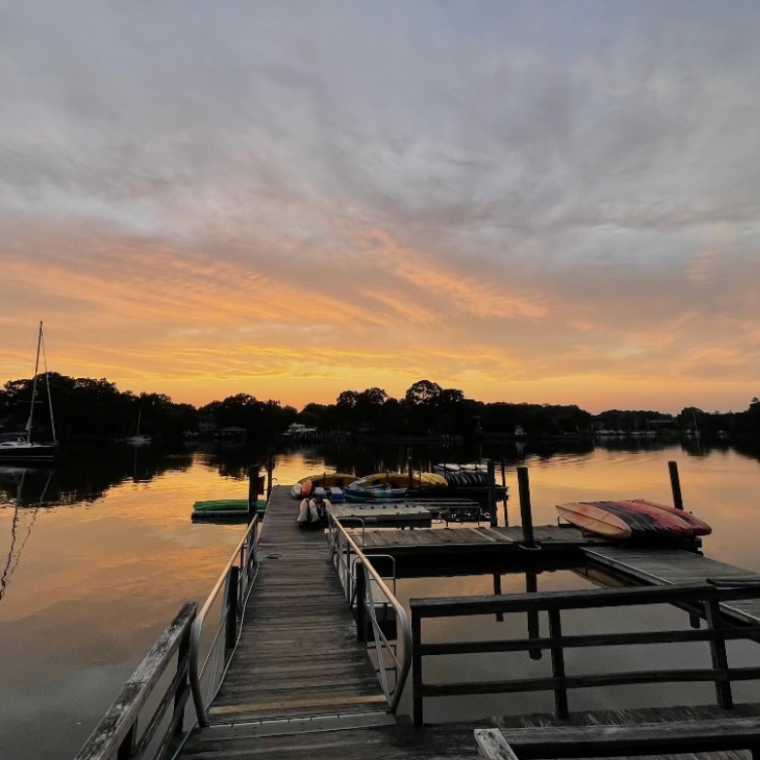 a sunset over a body of water