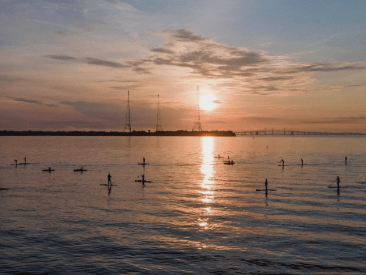 a sunset over a body of water