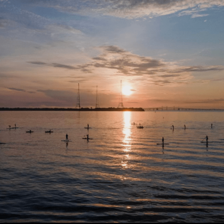 a sunset over a body of water