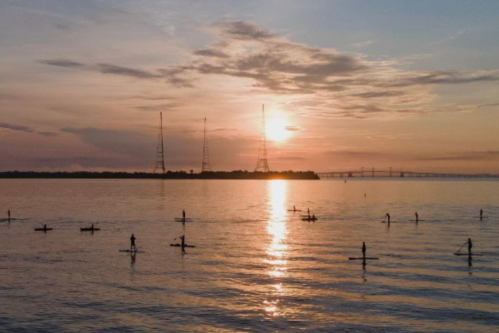 a sunset over a body of water