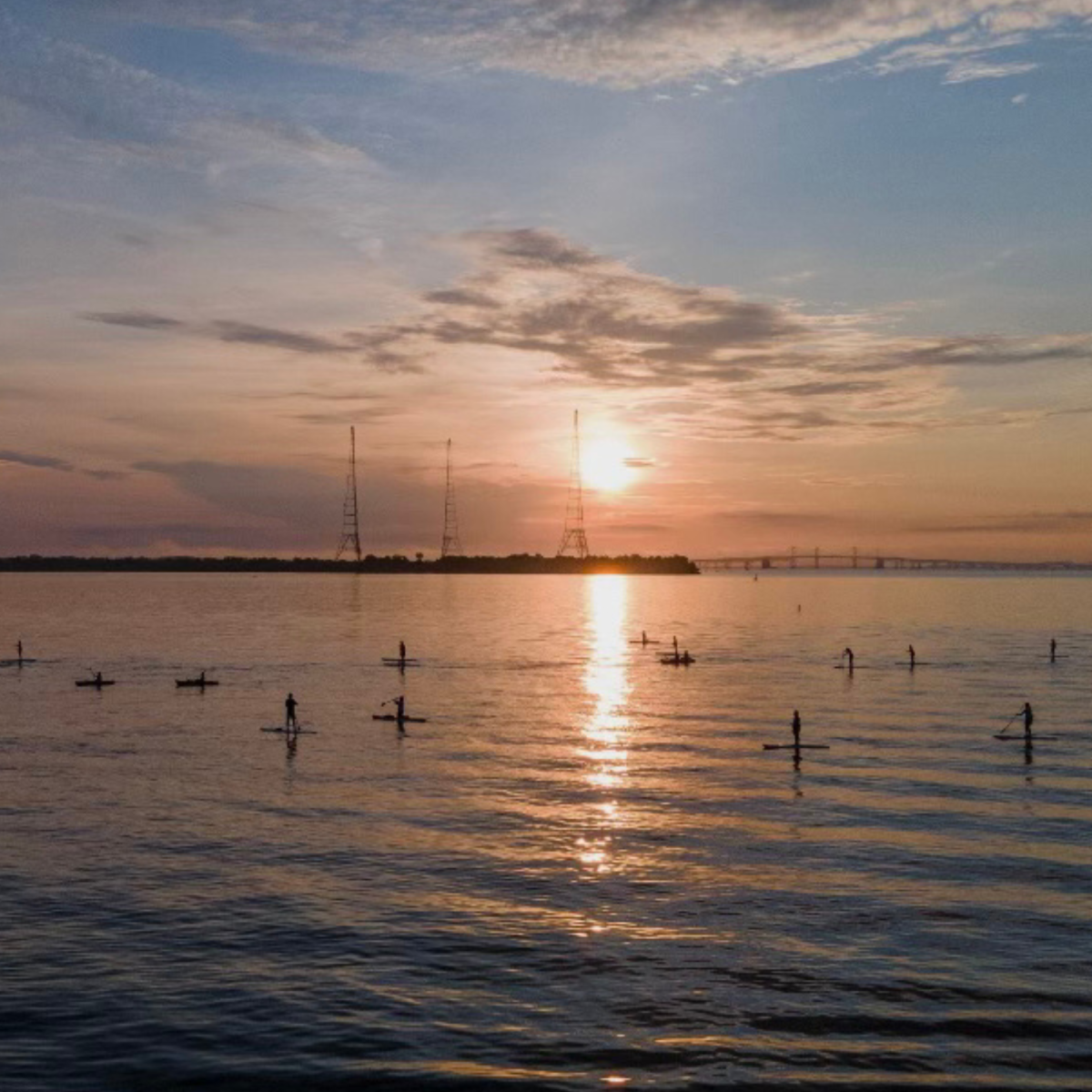 a sunset over a body of water