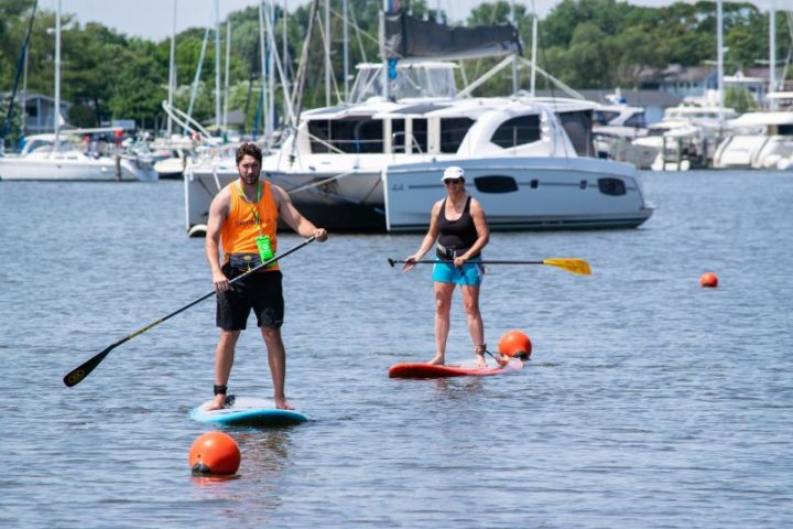 a group of people on a boat in the water